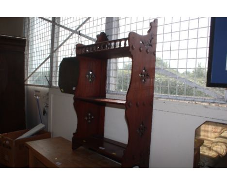 A late Victorian mahogany wall shelf