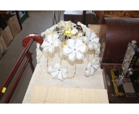 A brass and glass light shade
