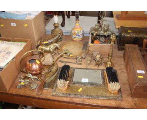 A quantity of various metalware to include a mirror and brush set; a breadboard etc.