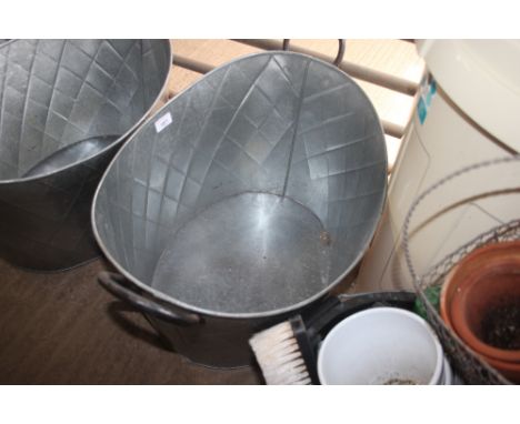 A metal oval planter (37)
