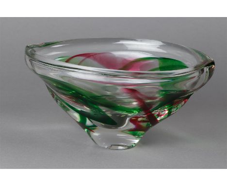 A colored glass, unique table bowl, (unique) by Max Verboeket. Made of solid crystal glass with green and (light) blue color 