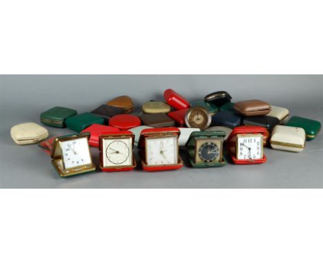 A large collection of travel alarm clocks, mainly first half of the 20th century. Not tested for operation.