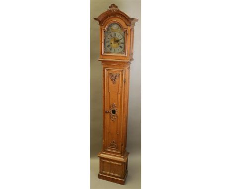 An oak grandfather clock with striking mechanism with double bell. France, circa 1800. (Not tested for long-term performance)