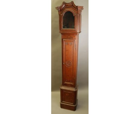 An oak case for a longcase watch with carving and intarsia. France, first half 19th century.H.: 245 cm. 