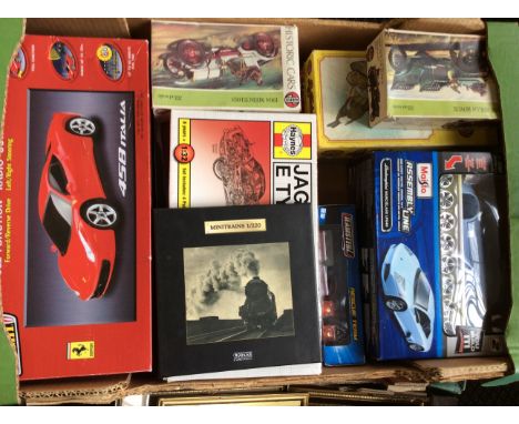 Four boxes of various model cars