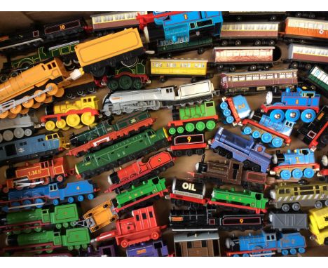 Three boxes of model trains