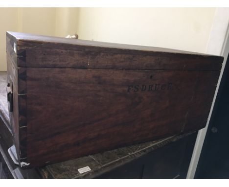 A mahogany travel trunk