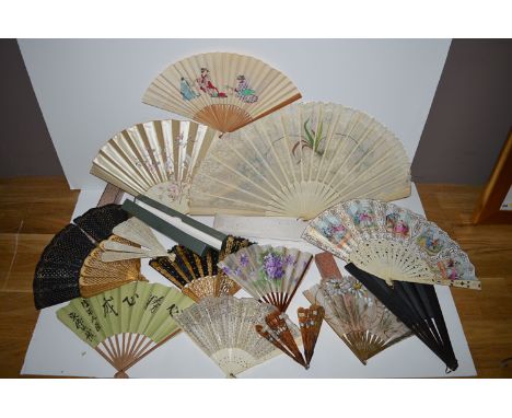 A collection of late 19th/early 20th Century fans, to include: a lace and bone, with hand-painted flower decoration; a hand-p