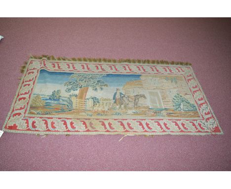 A late 19th Century needlework panel depicting a hunter and his horse with dogs, leaf and ribbon pattern borders, tassels to 