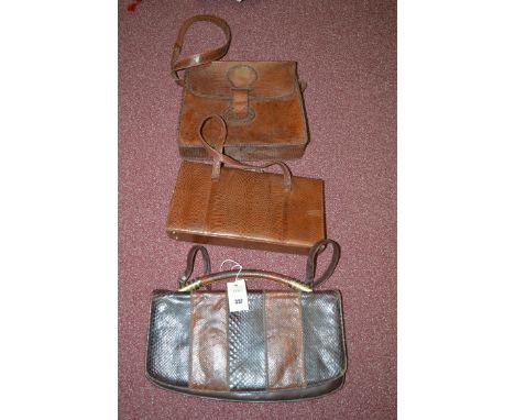 Two vintage lizard handbags, to include: Swallow by Model; together with a python skin handbag, with giltmetal mount to handl