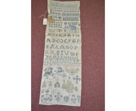 An 18th Century East German sampler (Stickmustertuch), alphabet, decorated with dog, eagle, figural, peacock and stylized mot