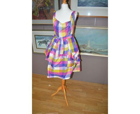 A Vivienne Westwood "Anglomania" multi coloured check pattern cocktail dress, scoop neck, ruffle waist with tie ribbon belt, 