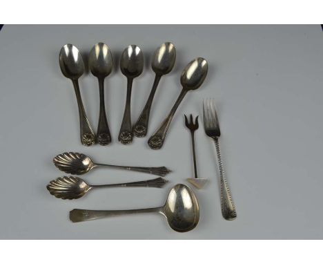 Various items of small table silver comprising five shell pattern teaspoons; a feeder spoon; a mother of pearl set olive fork