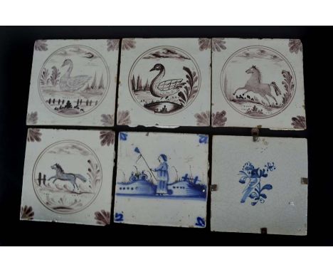 A blue & white Delft tile, decorated with a figure fishing; another, centrally decorated with a bird amidst foliage with an i