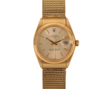 ROLEX OYSTER PERPETUAL DATE: AN 18CT GOLD GENTLEMAN'S BRACELET WATCH with automatic movement, the silver dial with gold baton