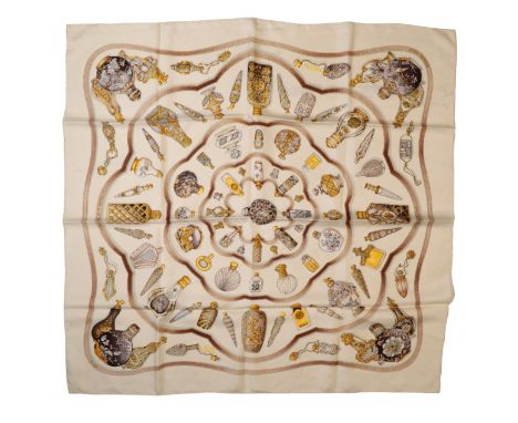 HERMES, PARIS: A "POURVU QU' ON AIT L' IVRESSE" SILK SCARF 88cm x88cm, contained in a "Hermes Paris" plastic bag