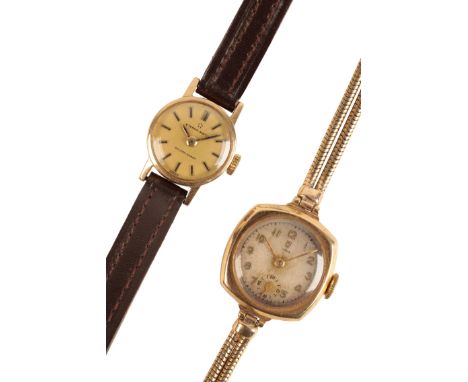 TUDOR: A LADY'S 9CT GOLD DRESS WATCH with manual wind movement, the silver dial with gold Arabic numerals, gold hands and sub