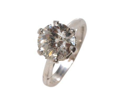 A DIAMOND SOLITAIRE RING the brilliant-cut diamond c. 2.25ct, on an unmarked white metal expanding arthritic shank, with open