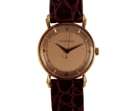 JAEGER-LECOULTRE:  AN 18 CT GOLD GENTLEMAN'S WRISTWATCH with manual wind movement, the rose-gold coloured dial with gold bato