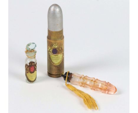 2 Art Deco Miniatur Flakons dabei zylindrisch gedrehte Form mit Glassotpfen und schauseitigem Etikett *Ranée Surangi* H ca. 5