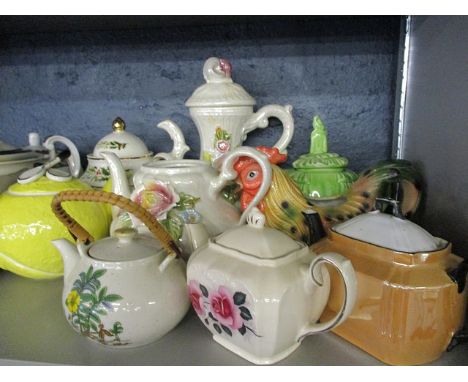 A collection of 20th century teapots and tableware to include Poole pottery
