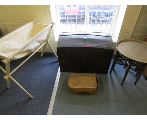 A mixed lot to include a domed top trunk, a Cairo brass topped folding table, a Victorian folding cot and a boxed Junior Hoov