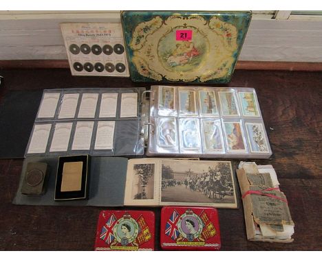 A mixed lot to include Chinese coins, albums of cigarette cards, glass lantern slides, tins and other items