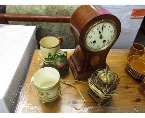 A mixed lot to include an Edwardian mantel clock, Devon ware and other ceramics