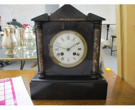 A Victorian slate mantel clock with enamelled dial, 11 h x 10 w