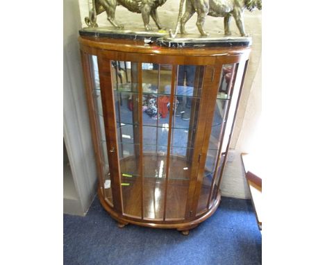 An Ercol style display bookcase, 52h x 31w x 14d, with leaded doors, together with a mid 20th century walnut display cabinet,