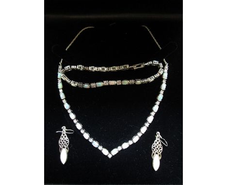 A 925 silver, opal and white stone necklace, bracelet and earring set, boxed, possibly Scottish