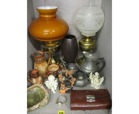 Two jade model animals and a Buddha two on wooden stands, 2 h - 4 h