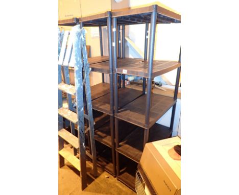 Three sets of plastic self assembly shelf units each with five shelves 70 x 37 cm each standing H: 168 cm 