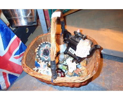 Basket of mixed ceramic figurines and a tea pot 