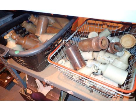 Shelf of antique earthenware ink bottles 