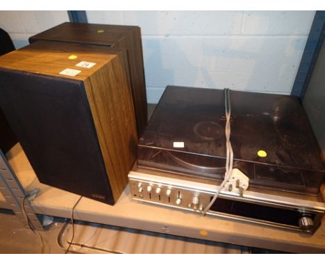 Toshiba record deck with combined radio and a pair of Sanyo speakers  CONDITION REPORT: All electrical items in this lot have