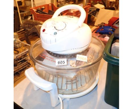 JML halogen oven with instructions and cook books  CONDITION REPORT: All electrical items in this lot have been PAT tested fo
