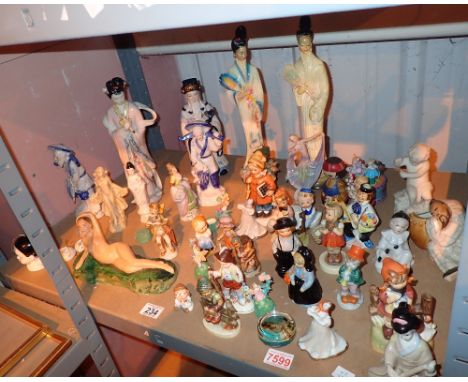 Shelf of ceramic figurines 