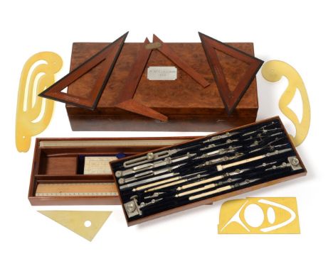 J Halden & Co Ltd Set Of Drawing Instruments in walnut case with two lift out drawers: top layer contains various compasses, 