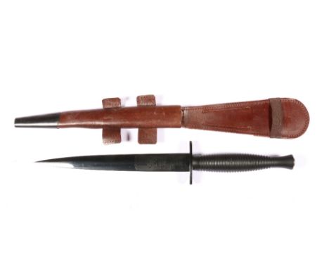 British commando dagger or fighting knife (stilletto) in blue steel, the ricasso marked for Wilkinson Sword, complete with le