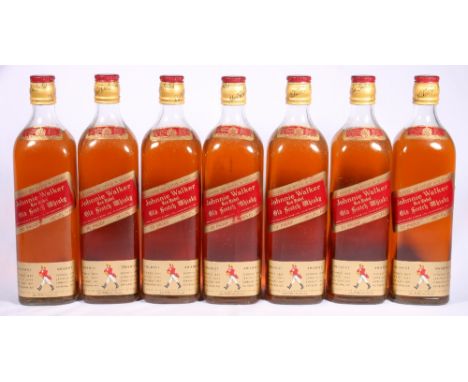 JOHNNIE WALKER red label blended scotch whisky, a part case of seven bottles each 26 2/3floz 70o proof in pictorial case