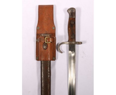 British pattern 1907 bayonet having hooked quillion, wood grip, the fullered blade with ricasso stamped Wilkinson, crown abov