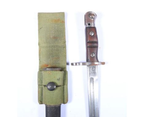 USA sword bayonet M1917 having deep fullered blade with ricasso stamped 1917 and Remington, wood grip complete with scabbard,