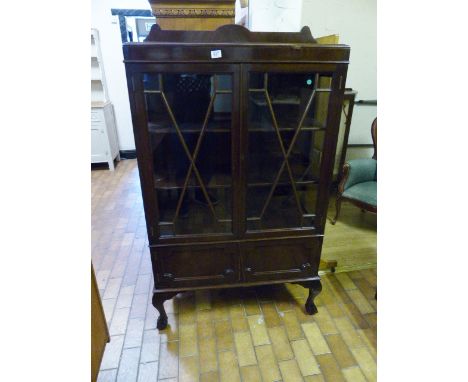 OAK GLAZED BOOKCASE. Oak glazed two shelf bookcase with cupboard on ball and claw supports  91 x 151cm