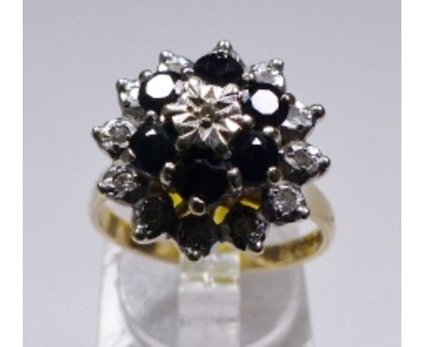 9 CT SAPPHIRE & DIAMOND CLUSTER RING. 9ct yellow gold sapphire and diamond cluster ring, size P