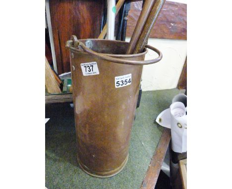 COPPER STICK STAND. Copper stick stand and two ceramic topped walking sticks, horses head and dogs head