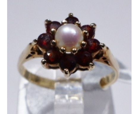 9CT GOLD DIAMOND RING. 9ct gold garnet and pearl ring, size J