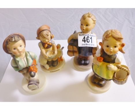 FOUR GOEBEL FIGURINES. Four Goebels boy and girl figurines