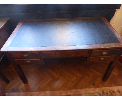 OAK TWIN PEDESTAL DESK. Oak twin pedestal desk with black leather inlay to top and shell handles to drawers  L ~ 135cm 