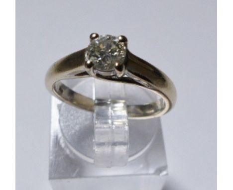 18CT WHITE GOLD RING. 18ct white gold diamond solitaire ring, size K